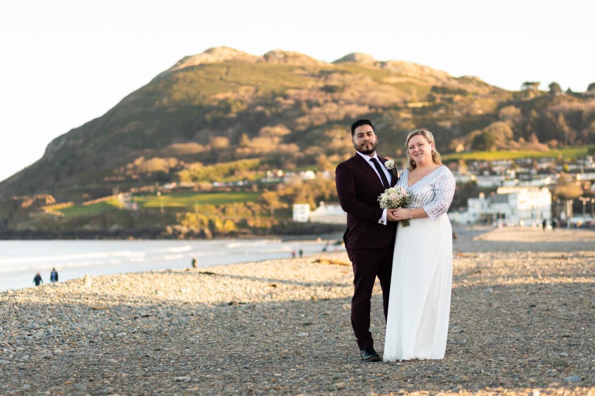 bride and groom on bray beach for their wedding photographs