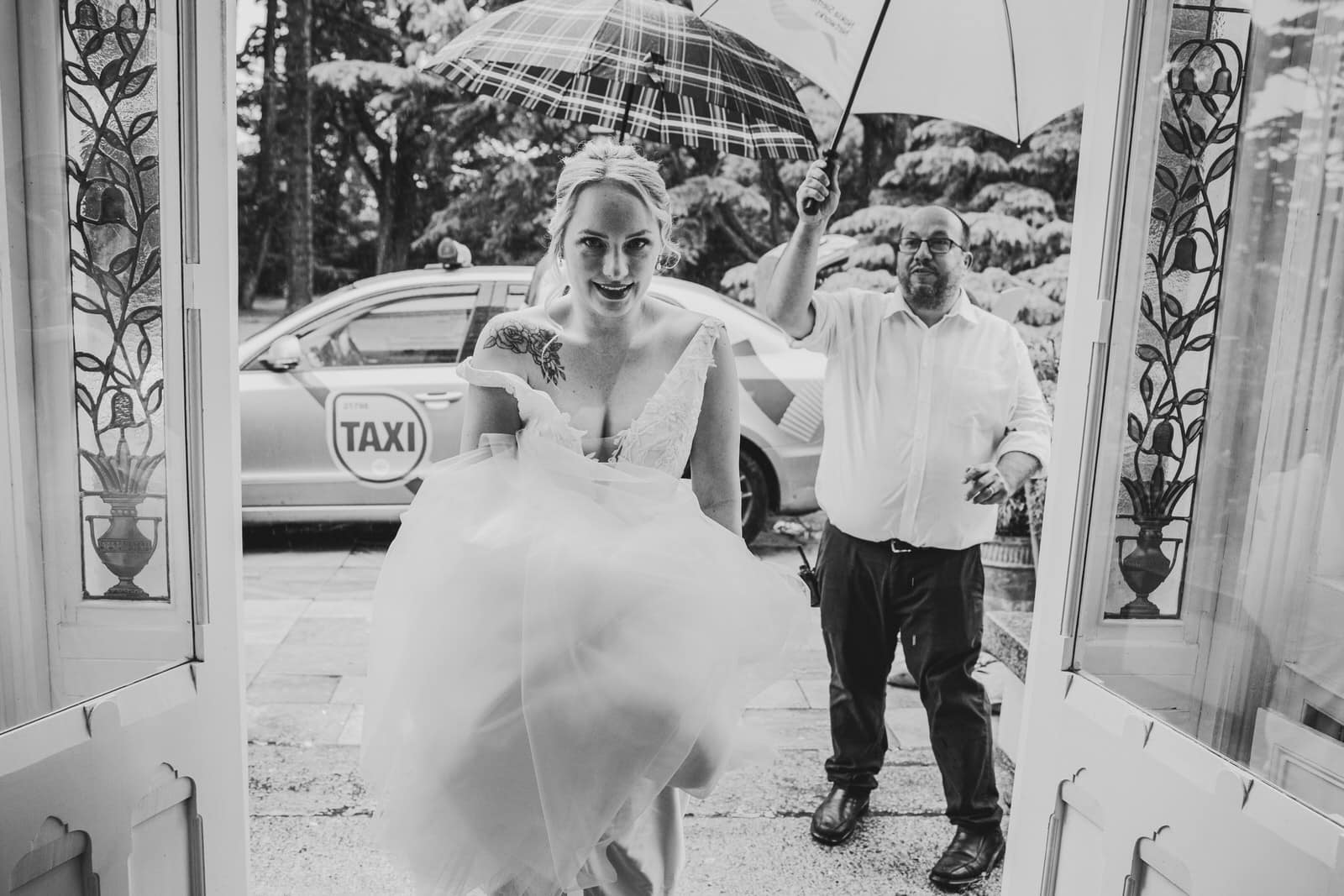Bride under umbrella