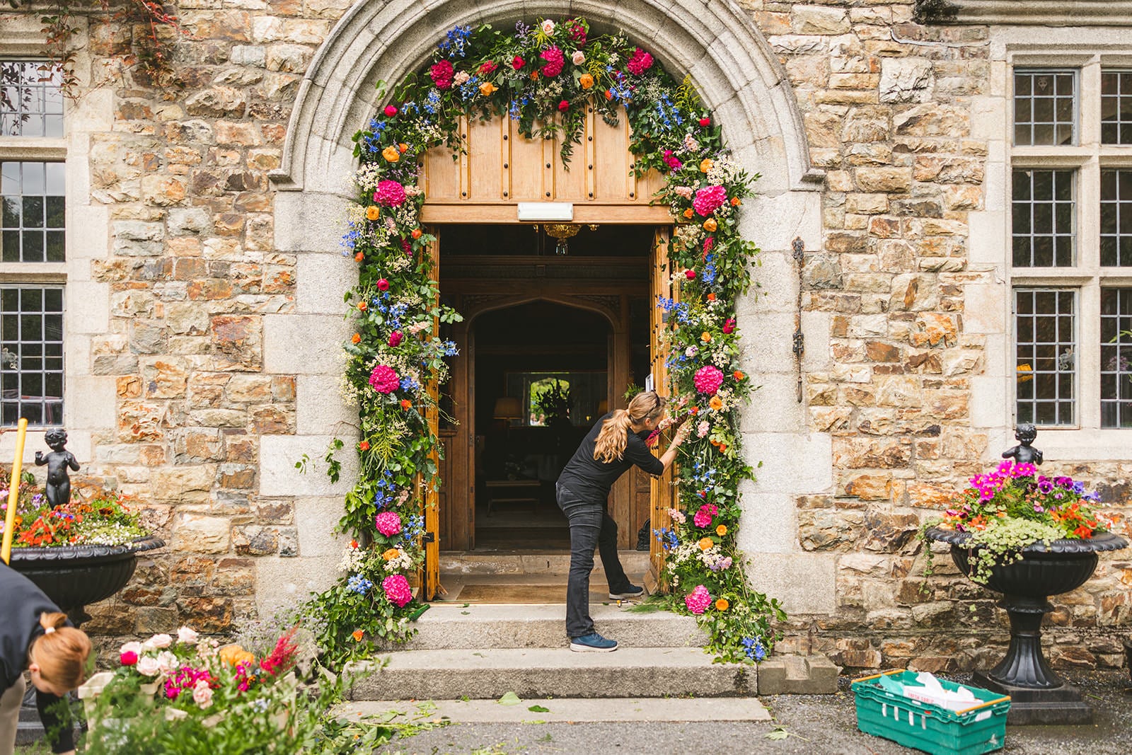 Colourful Floral arch irish castle wedding